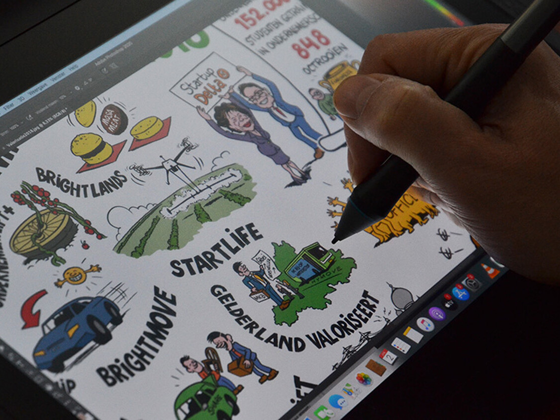 Live cartoonist tekent op digitaal tablet